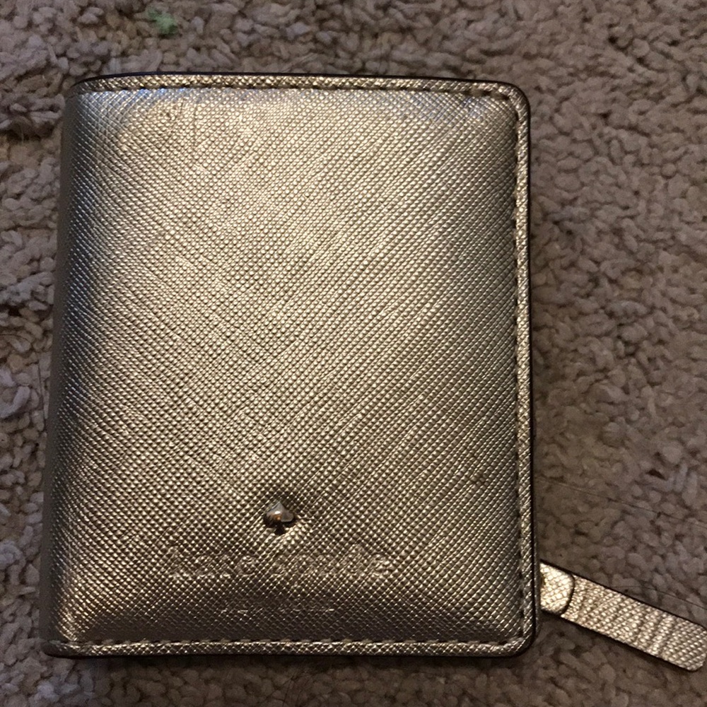 Mini Kate spade wallet.